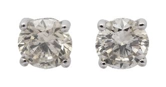 A pair of diamond ear studs