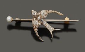 A mid Victorian diamond-set and pearl swallow bar brooch