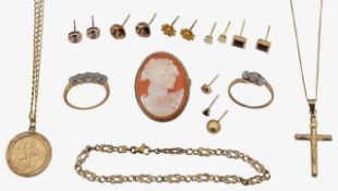 A five stone diamond ring, a three stone diamond ring and others