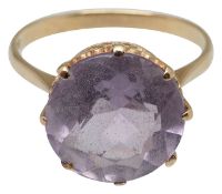 An amethyst dress ring