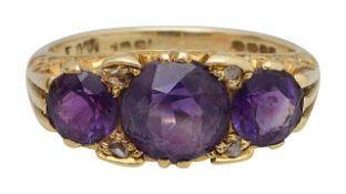 An 18ct amethyst and diamond dress ring