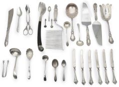 A collection of mostly American silver serving items and other silver