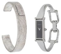 A stainless steel quartz Gucci bracelet watch with Gucci cuff bracelet