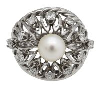 A handmade diamond and pearl bombe ring