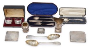 A collection of silver to include an Edwardian helmet shaped cream jug