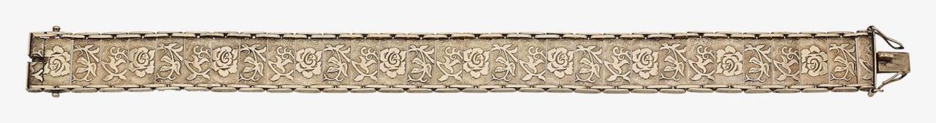 A 9ct gold 80's panel bracelet with rose motif