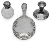 An Edwardian silver hand mirror and other items