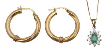 A 9ct emerald drop pendant and a pair of 9ct earrings