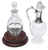 A silver mounted Dartington crystal claret jug and a silver mounted decanter