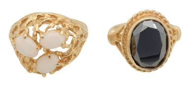 A 14ct opal ring and 9ct hematite dress ring