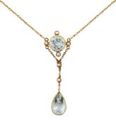 An Edwardian aquamarine and pearl pendant on chain