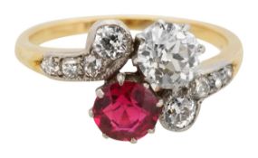 A diamond and synthetic ruby cross over ring