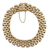 A 9ct bicolored gold articulated bracelet
