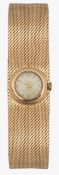 A manual wind 18K gold ladies bracelet wristwatch