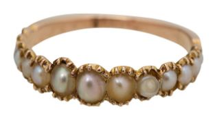 A Victorian seed pearl half hoop eternity ring