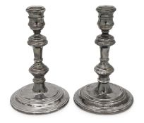 A pair of Elizabeth II silver candlesticks in George I style