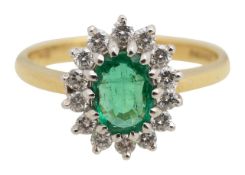 An 18ct emerald and diamond cluster ring