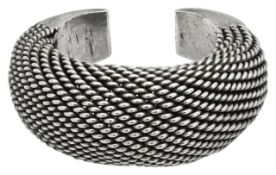 A stylish tribal cuff bracelet, possibly Burmese