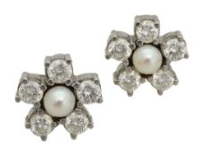 A pair of diamond and pearl ear studs