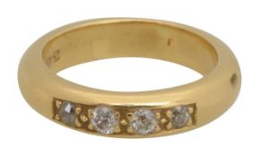 A diamond set wedding band