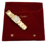 A lady's 18K gold Cartier Tank Francaise wristwatch