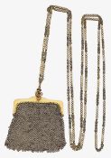 A 9ct late Edwardian mesh purse with Etruscan style chain