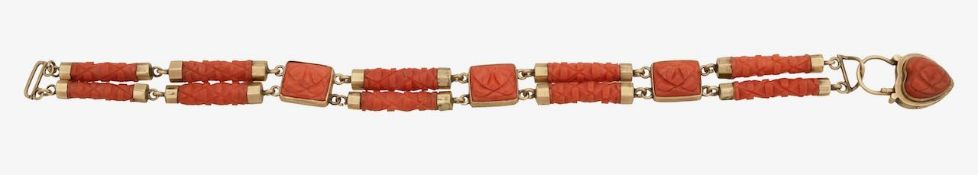 A carved coral and gold sentimental bracelet