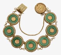 A Chinese seven disc jade bracelet