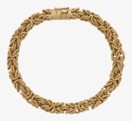 An Etruscan style fancy rope link chain bracelet