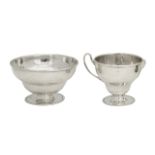 A George V silver sugar basin and milk jug