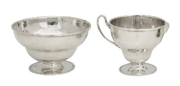 A George V silver sugar basin and milk jug