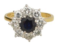 An 18ct sapphire and diamond cluster ring