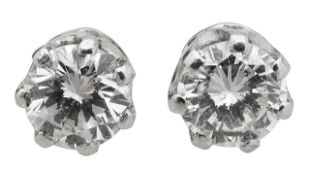 A pair of brilliant cut diamond ear studs