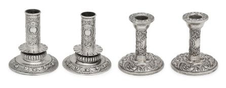 A pair of 17th century style silver dwarf candlesticks