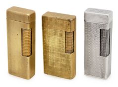 Three Dunhill 'Rollagas' cigarette lighters