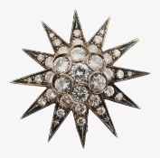 A diamond-set star brooch/pendant