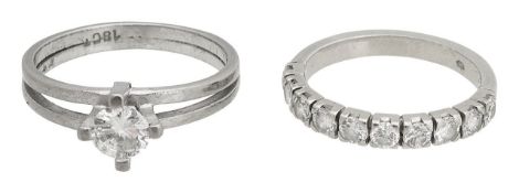 A single stone diamond ring and eternity band