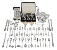 A collection of silver teaspoons and other items