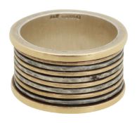 A silver multi band spinning ring