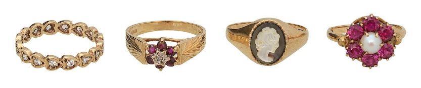 A 9ct gold ruby and diamond ring and three others