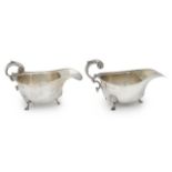 A pair of George VI silver sauceboats, in the George II style