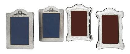 A pair of two Elizabeth II silver mounted photograph frames