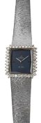 An 18ct white gold and diamond Omega de ville wristwatch