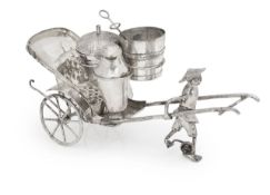 A Chinese white metal cruet set in the form of a man pulling a rickshaw