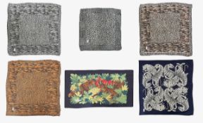 A collection of Yves Saint Laurent scarves and others