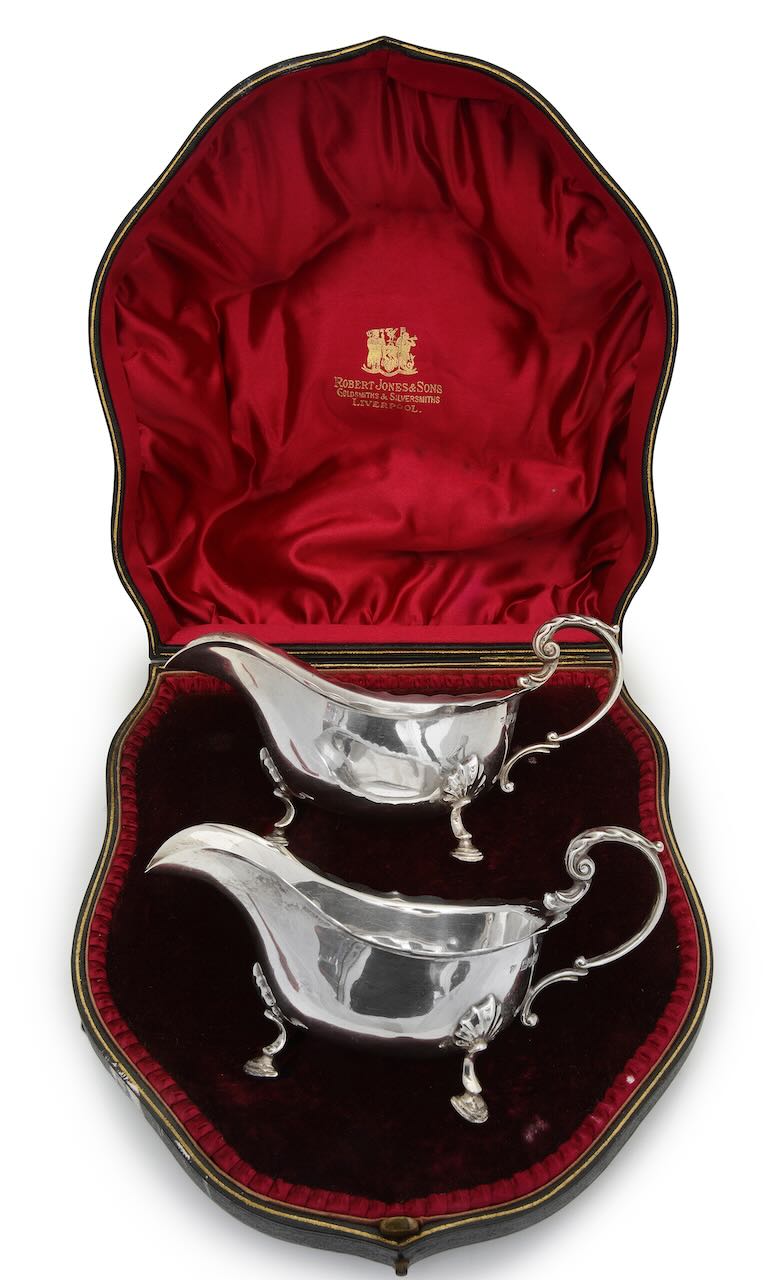 A pair of Edward VII silver sauce boats, in the George II style