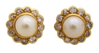A pair of 18ct diamond and pearl ear rings