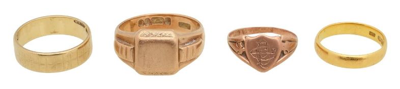 A 22ct wedding band and three 9ct rings