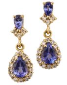 A pair of diamond and tanzanite ear pendants