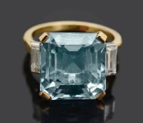 An aquamarine and diamond baguette dress ring